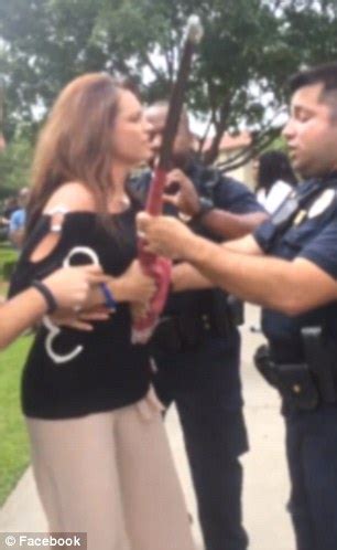 American Vet And Playboy Model Michelle Manhart Arrested For Taking American Flag From