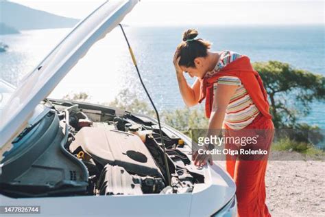 Bent Over Car Photos And Premium High Res Pictures Getty Images