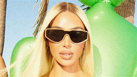 kim busts out of tiny nude swimsuit in racy new photoshoot flipboard