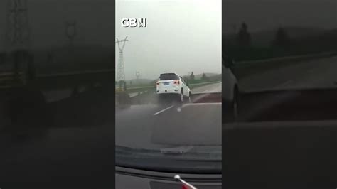 Dramatic dashcam footage shows the moment a car drives off a collapsed