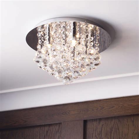 Brighten up your living room with a striking chandelier. Galaxy Flush K9 Crystal Ceiling Light - Chrome | Litecraft