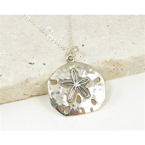 Pin By The Graceful Elf On My Polyvore Finds Sand Dollar Necklace Sea Life Necklace Silver Seas