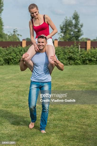 Carrying A Person On Shoulders Photos And Premium High Res Pictures