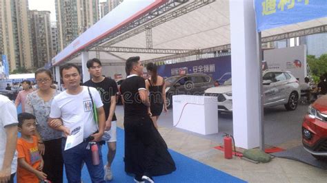 Shenzhen China Weekend Auto Show Sales People Are Watching Cars Or