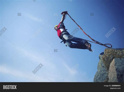Jump Off Cliff Into Image And Photo Free Trial Bigstock