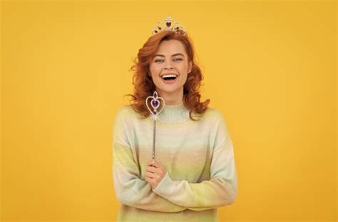 Premium Photo True Emotions Happy Redhead Woman In Crown Queen Hold