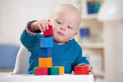 Baby Boy Playing With Toy Blocks Stock Photo Dissolve