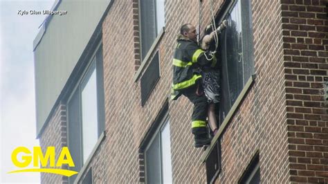 Firefighters Rescue Woman Dangling From 16th Floor Window L Gma Youtube