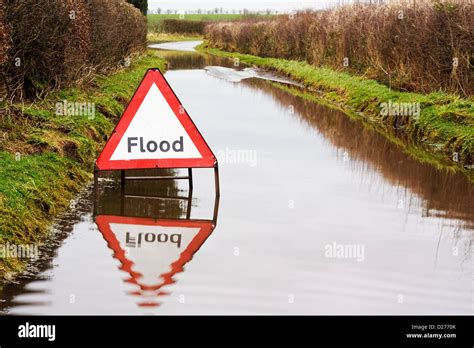 Triangular Flood Warning Sign Hi Res Stock Photography And Images Alamy