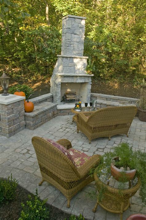 Beautiful Outdoor Fireplace With Sitting Walls And Paving Patio