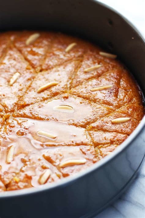 A delicious greek semolina cake recipe (samali) infused with the aromas and blends of mastic and garnished with a lemon and rosewater scented syrup! Turkish Revani Tarifi Semolina Cake in Lemon Syrup