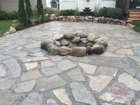 Chilton Flagstone Patio With Limestone And River Rock Retaining Wall