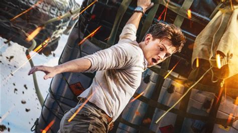 Tom Holland Hangs On For Life In New Uncharted Poster