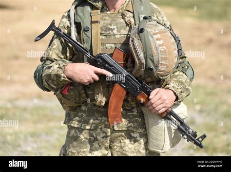 Soldier Of Ukraine Ukrainian Soldier With Assault Rifle Ak Stock Photo