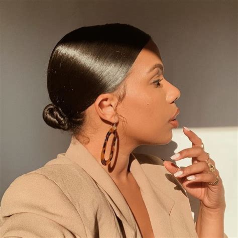 To create this look for yourself, check out our easy messy bun tutorial for long hair that you can master in. slick back bun on natural hair in 2020 | Slicked back hair ...