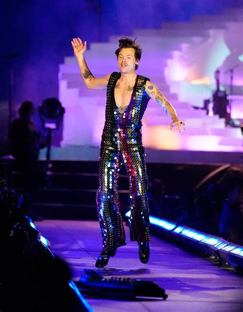 Harry Styles Goes Bold In A Multicolored Sequined Jumpsuit And Boots