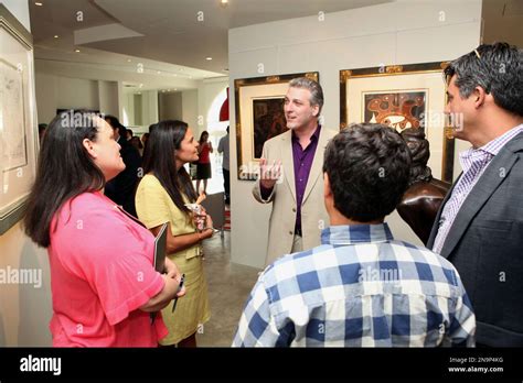 Alexandre Renoir Center Speaks With Art Aficionados And Candy Lovers
