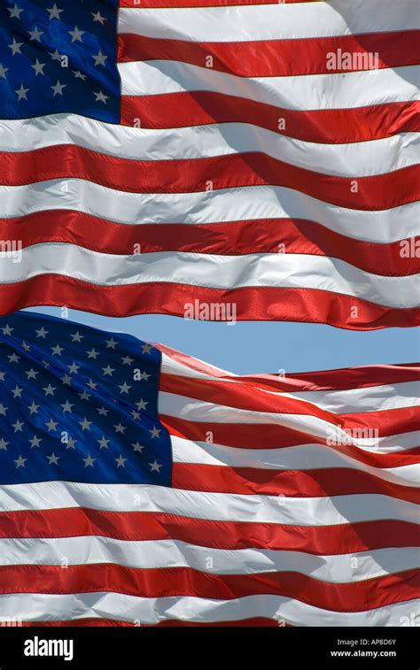 Two Contemporary Us Flags 50 Stars Flying Together Stock Photo Alamy