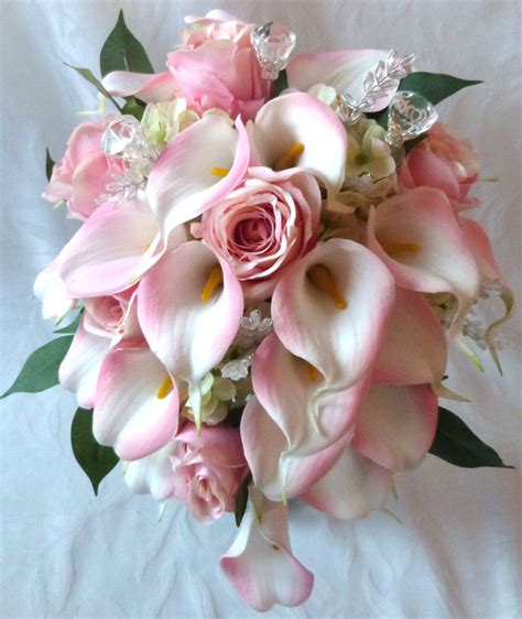 Wedding bouquets for every bride's budget. Blush Pink rose and pink Calla lily cascading wedding bouquet