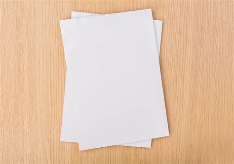 Free Photo Top View Of Pieces Of Paper On Wooden Table