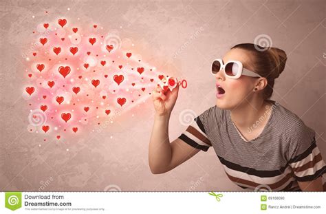 Pretty Young Girl Blowing Red Heart Symbols Stock Photo Image Of Face