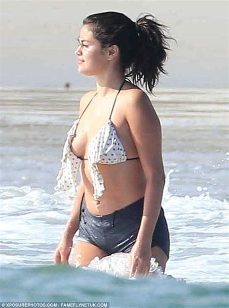 Selena Gomez Shows Off Her New Curves In Skimpy Frilled Bikini Top
