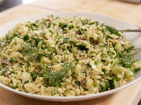 3/4 cup good black olives, such as kalamata, pitted and diced. Herbed Orzo with Feta Recipe | Ina Garten | Food Network