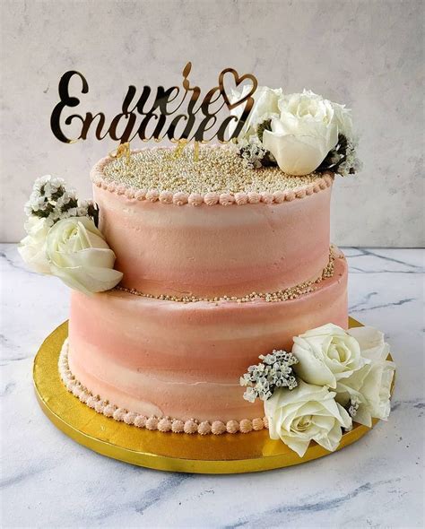 On the inside it was red velvet, caramel and dark chocolate. 13 Awesome Engagement Cake Designs We Spotted By Indian ...