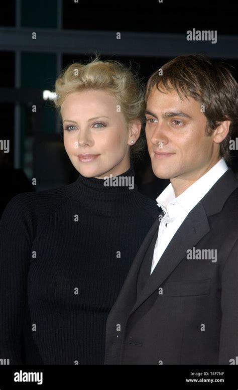 Los Angeles Ca April 06 2004 Actress Charlize Theron And Boyfriend Actor Stuart Townsend At