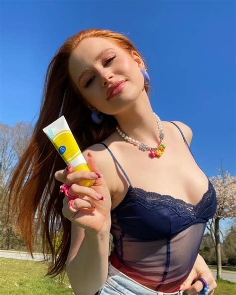 Redheaded Hottie Madelaine Petsch Exposes Her Cleavage For The Camera
