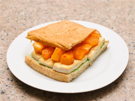 The inspiration for this fried tofu sandwich comes from many places. How to Make a Pan Fried Tofu and Kimchi Sandwich with ...
