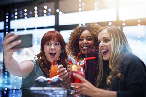 Women Friends And Phone Selfie At Club With Drinks Having Fun Or Bonding Night Celebration