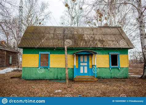 Old Wooden Abandoned House With Clogged Windows In A Russian Village