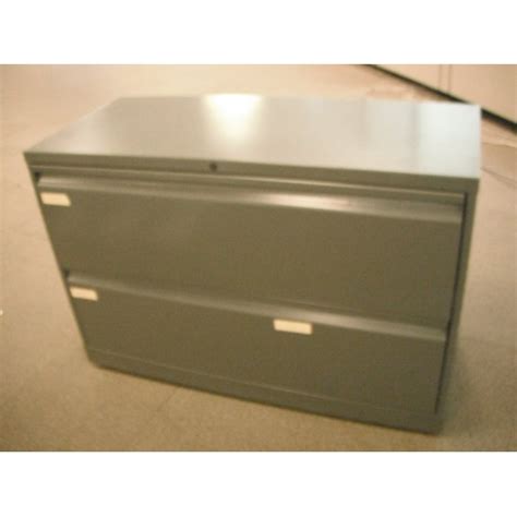 A filing cabinet (or sometimes file cabinet in american english) is a piece of office furniture usually used to store paper documents in file folders. 2-Drawer Lateral File Cabinet Knoll Grey 42x18x28 Locking ...