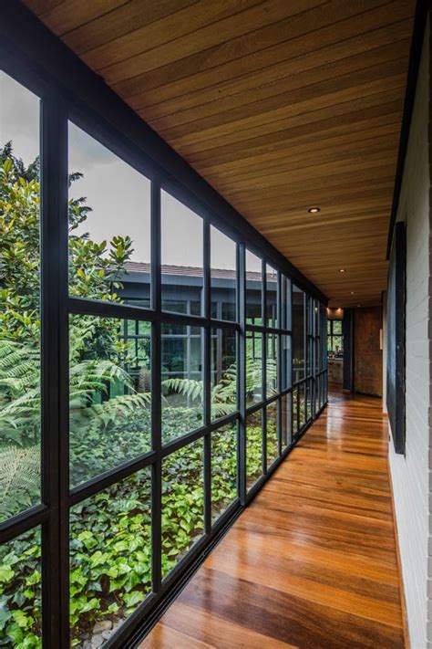This Triangular Shaped House Makes Room For An Interior Garden Modern