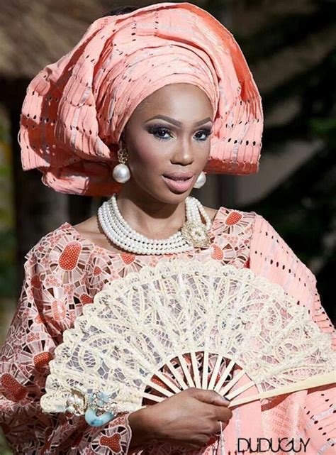 Pink Gele Nigerian Bride Wedding Idea With White Fan African Wedding