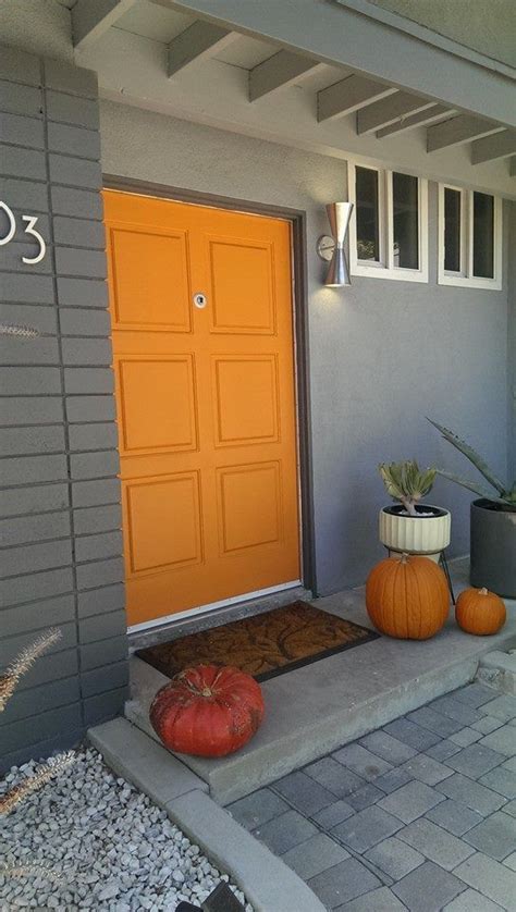 Many exterior front doors are sold unpainted and otherwise unfinished, with the expectation that the owner will paint it. Gorgeous mid century modern exterior house colors, gray ...