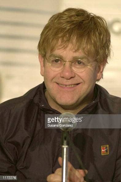 Musician Sir Elton John Smiles At A Press Conference To Present His