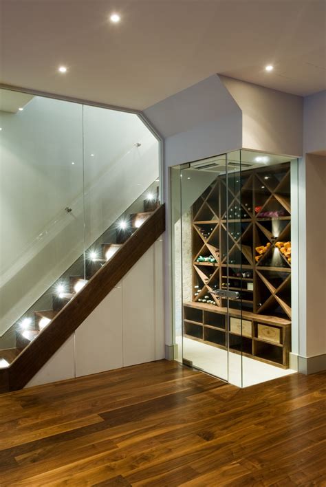 Finishing a basement is a great way to add value to your home. Splashy marvel wine cooler in Wine Cellar Contemporary ...
