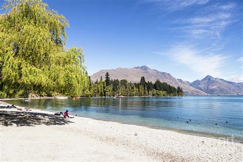 Queenstown Beach On Lake Wakatipu In New Zealand Photograph By Didier