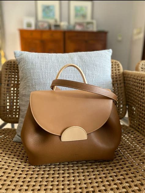 Polene paris purse, polene bag, polene paris outfit, winter fashion, mom jeans outfit, balloon sleeve top #polene polene numero un bag | the fancy pants report, a san francisco fashion blog. Pin by Graceng on Polene Paris in 2020 | Clutch handbag ...