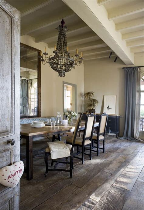 The romantic crystal chandelier brings this raw, rustic table from basic to breathtaking in this dining room from houzz.com. Rustic Chic Farmhouse:Brunch at Saks | Rustic chic, Room ...
