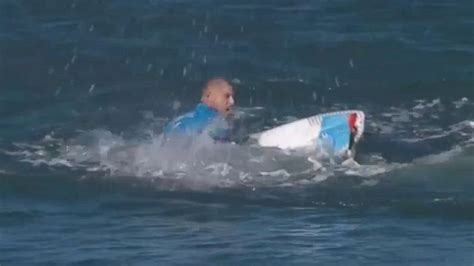 watch surfer fight off shark attack on live tv in south africa abc news