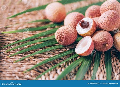 Lychee Fruits With Palm Leaves On Rattan Background Copy Space Exotic Litchi Lichee Fruits
