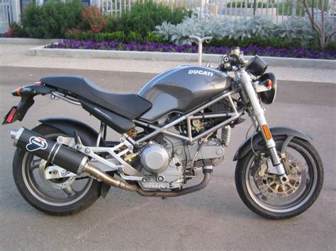 I purchased this 2001 monster 900ie from a friend of a friend for (in 2006 dollars) $2250. 2001 Ducati Monster 900 - Moto.ZombDrive.COM