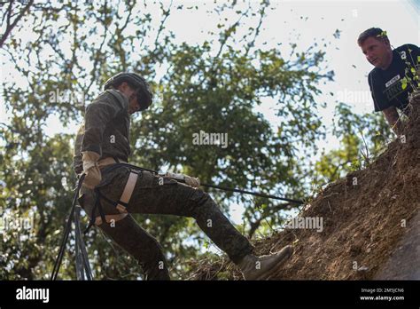 A Philippine Army Soldier Assigned To 1st Brigade Combat Team Rappels