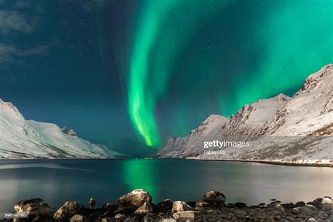 The Northern Lights Over Mountains In Norway High Res
