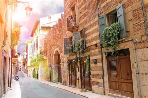 Sunny Day On The Streets Of Ancient Italian City Stock Photo Colourbox