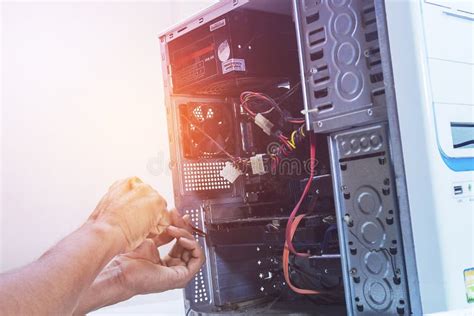 Technician Computer Pc Repairing Graphic Card Or Cleaning In The