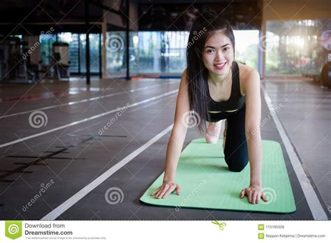 Beautiful Slim Young Woman Push Ups At Gym Stock Photo Image Of